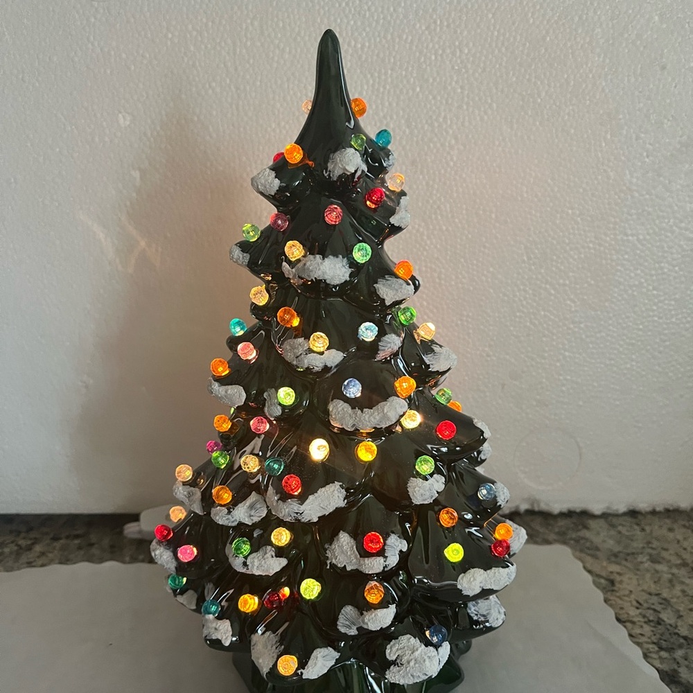 Glazed vintage ceramic tree poured from old mold .